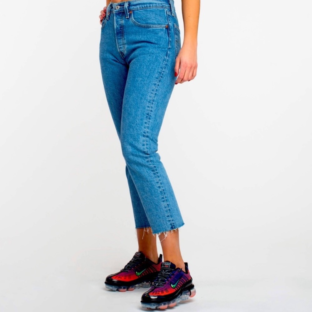 Lightly used 501 cropped raw hem jeans